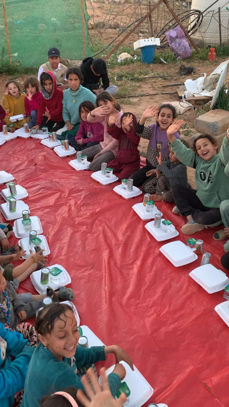 Children sharing a community meal